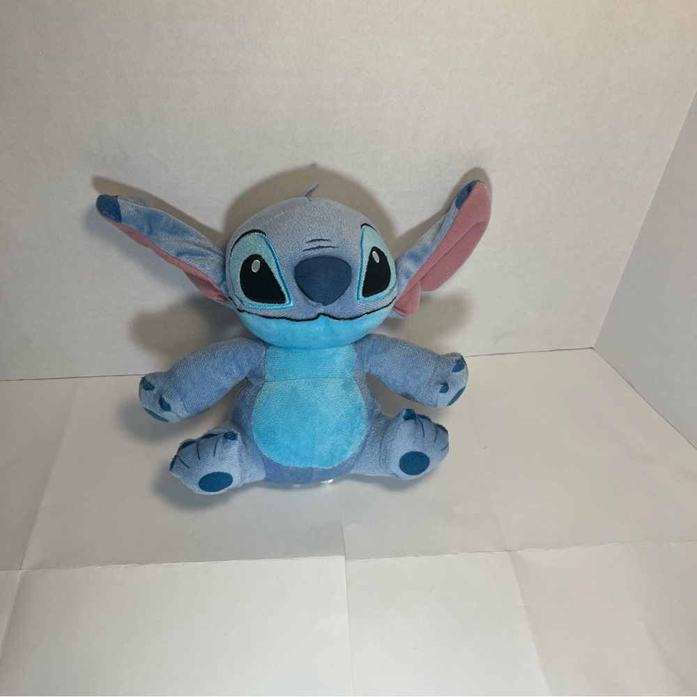 Disney Stitch plushy 10 inches tall with pink inside ears.